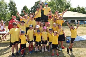 Sports Day Champions cheering with their trophy