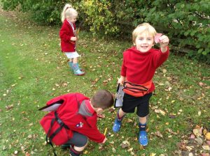 Ghyll Royd Pre-School child finds leaf on welly walk