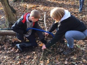 Ghyll Royd pupil sawing firewood