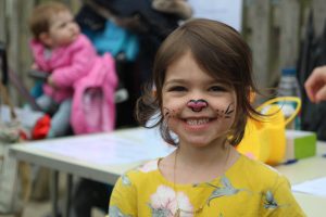 Ghyll Royd School pupil smiles with bunny face paint