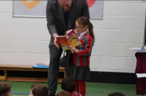 Ghyll Royd pupil reads out her published poem