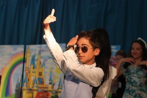 Ghyll Royd pupil posing as one of the 'beautiful people' in sleeping beauty performance