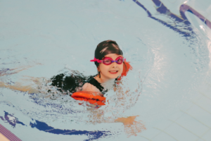student swimming